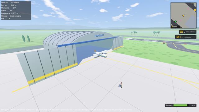 Aeroporto: l'hangar e l'aereo a elica sulla pista